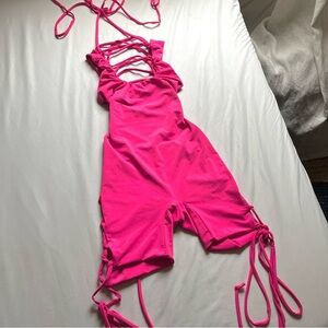 GEEBIN FLORES hot pink knit sleeveless lace up cutout biker romper cat suit